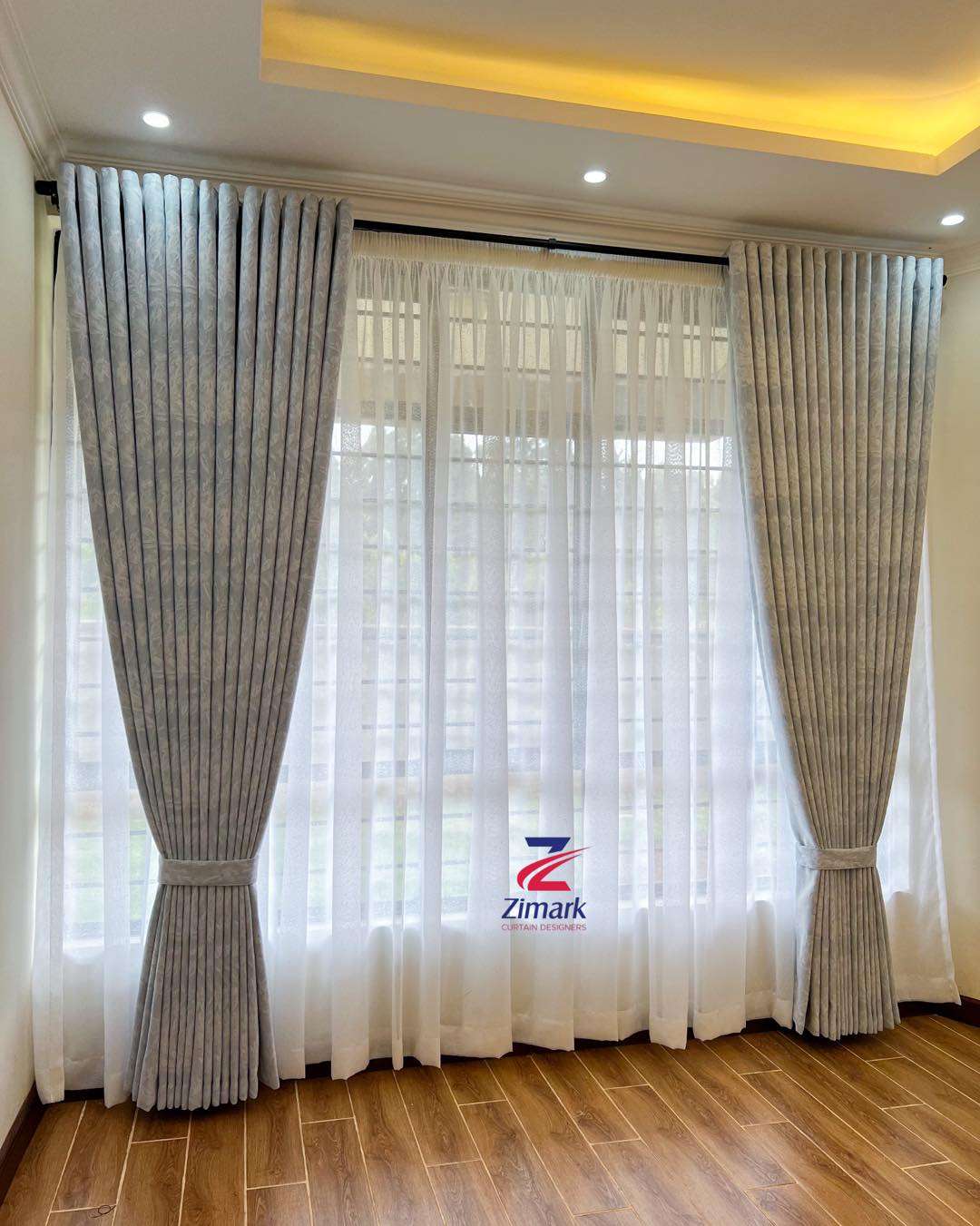 Elegant living room with floor-length drapery in Nairobi home