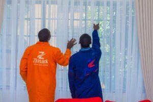 Elegant brand new sheers hanging gracefully on modern living room windows