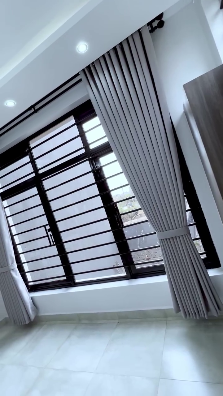 Elegant window treatments enhancing natural light in a modern living room